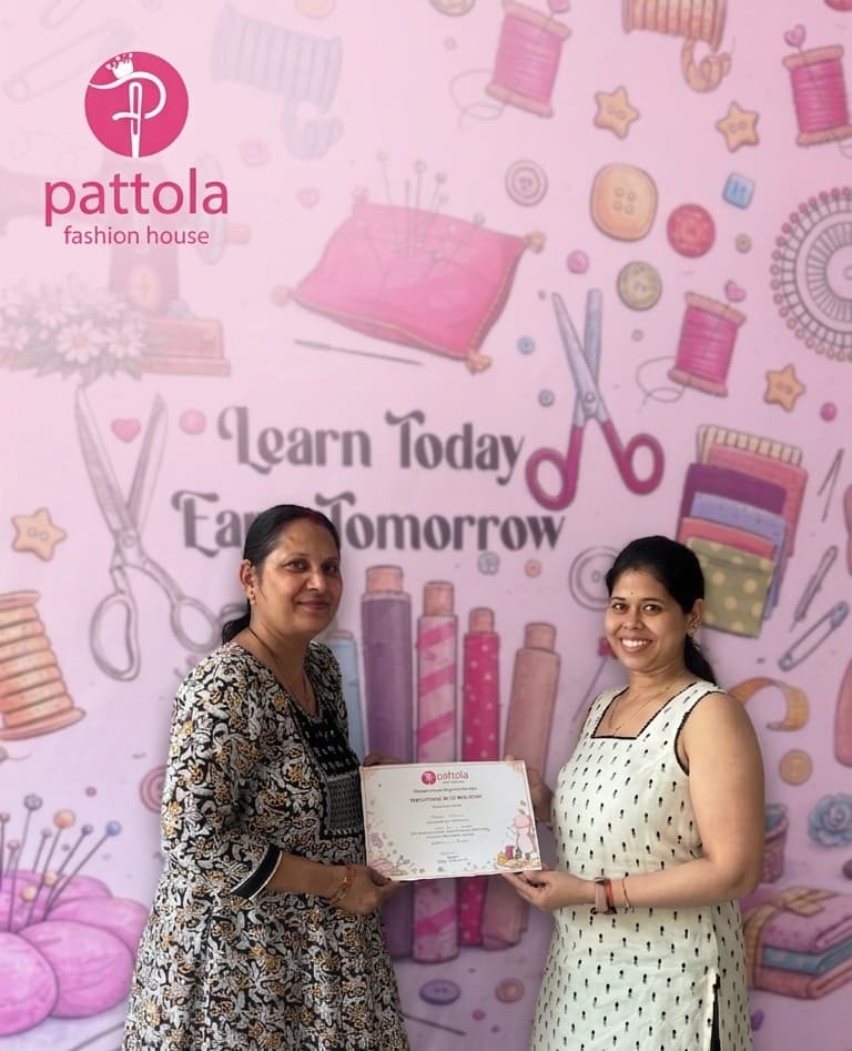 Student receiving stitching course certificate at Pattola Fashion House